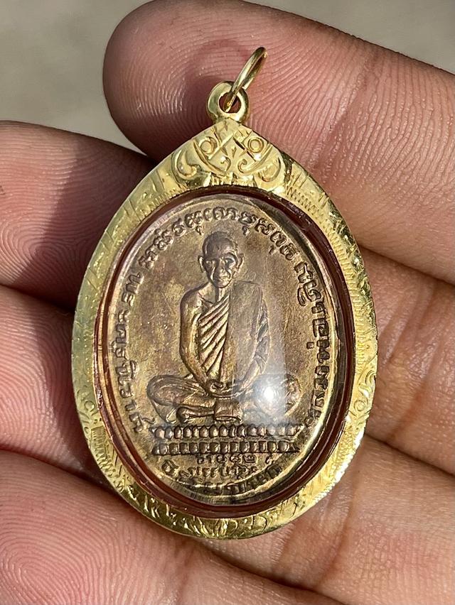 เหรียญรุ่นแรก หลวงพ่อเดิม วัดหนองโพ 2482 เนื้อทองแดง พิมพ์ดอกจันทร์ตรง รูปไข่ รูปที่ 10