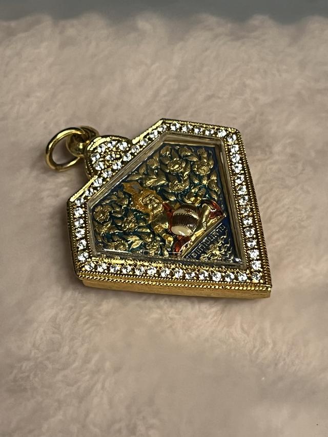 เหรียญพ่อแก่ตีตะโพนผ่านพิธีปลุกเสก 2