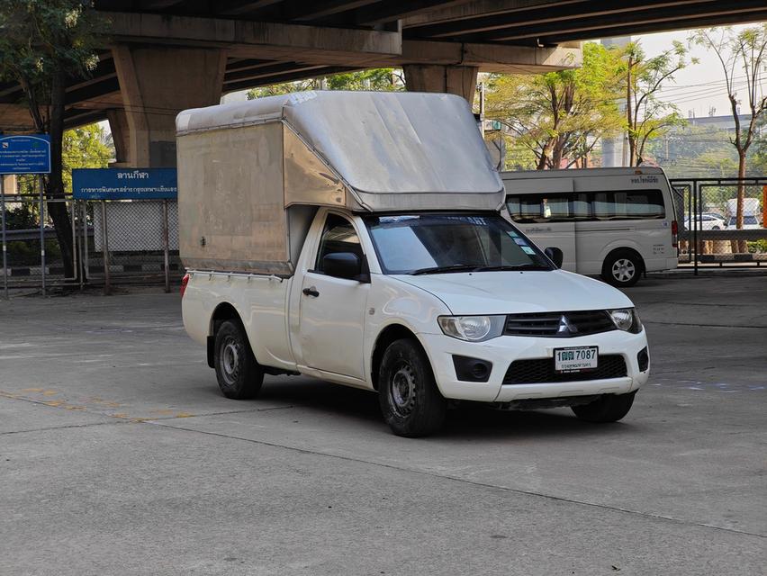 ขายรถ Mitsubishi Triton 2.4 หัวเดียว หลังคาสูง ปี 2015 สีขาว เกียร์ธรรมดา