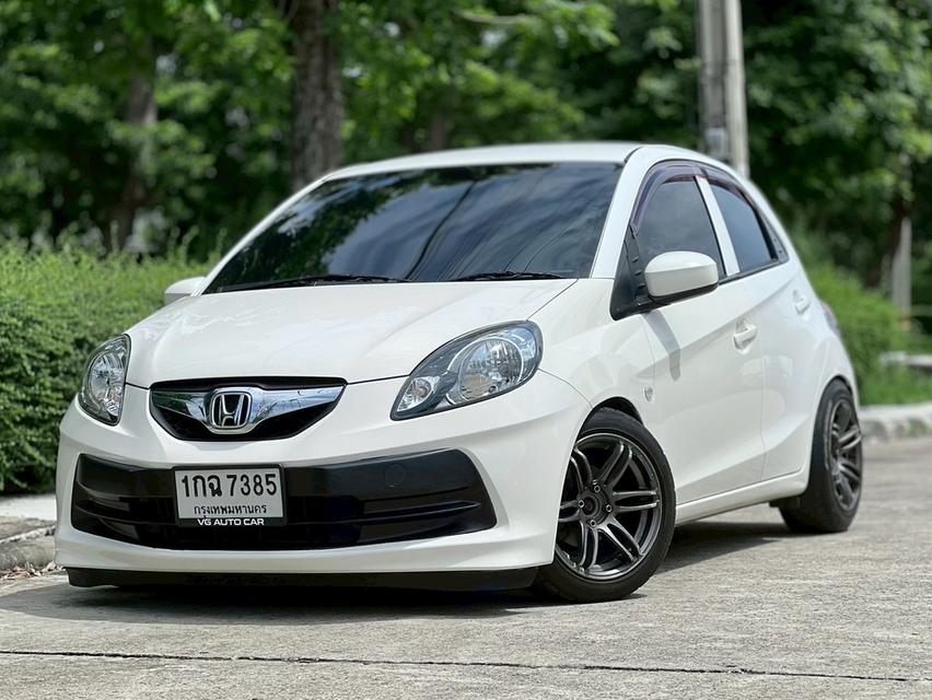 Honda Brio 1.2V ATเครื่องยนต์: เบนซิน เกียร์: ออโต้ ปี : 2012 สี: ขาว ไมล์ 9x,xxx km.