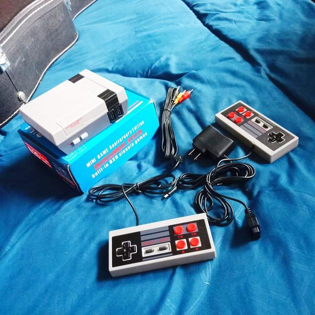 เครื่องเล่นเกมส์ ( รวมเกมส์ในเครื่อง 620 เกมส์ ) มีจอยสองอัน SUPER MINI เกมส์ตลับ Famicom MINI Family FC COMPACT