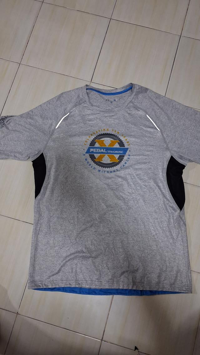 เสื้อยืดวินเทจมือสอง สีเทา PEDAL THE CAUSE A World Without Cancer PRIMAL Men's Performance Shirt XL มือสองสภาพดี ลายสกรีนสวยสไตล์Sport ทรงสวย รูปย่อยที่ 1