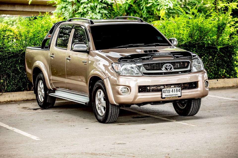 Toyota Vigo Double Cab 4 ประตู 2.5G ดีเซล เกียร์ Auto ปี2009 สีน้ำตาล