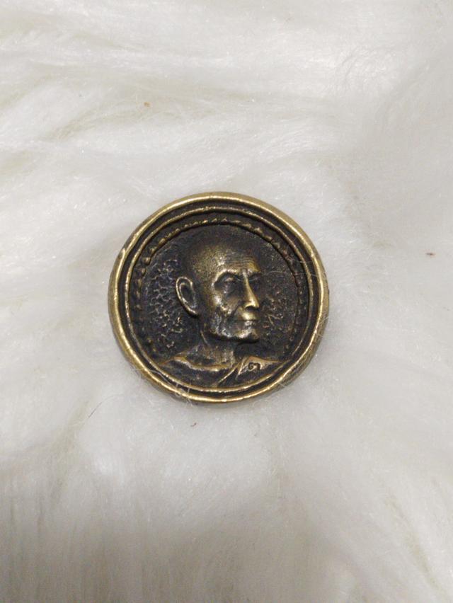 รูป เหรียญหล่อล้อแม๊กซ์ใหญ่ เนื้อเงินปี 2521