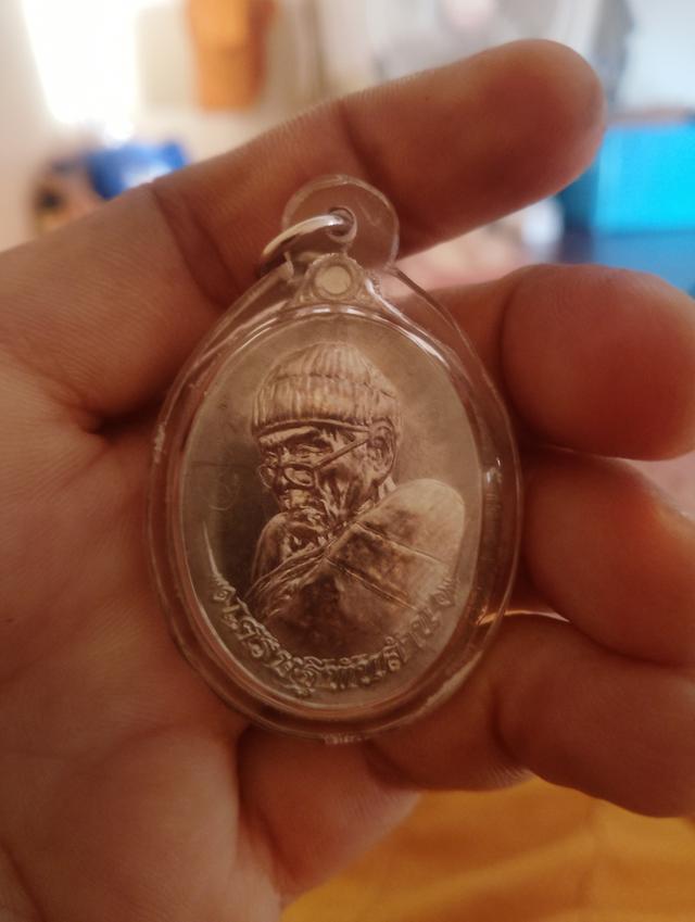 เหรียญหลวงปู่อิ่ม รุ่นเศรษฐีพันล้าน หลังตระกรุดทองคำ9ดอกโค๊ต333