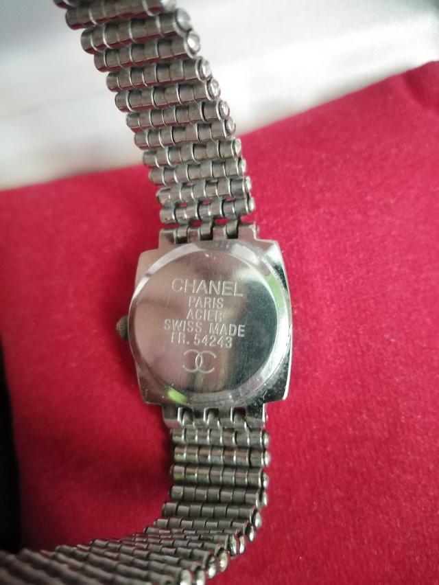 นาฬิกาแบรนด์ CHANEL PARIS©(เกรด)หน้าปัด25mm.ปัดขาวฝังเพชรล้อมรอบ สายสแตนเลสถัก