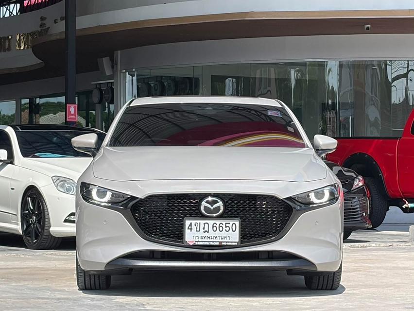 2023 MAZDA MAZDA3, 2.0 SP SPORTS โฉม ปี19-ปัจจุบัน 5Dr สีน้ำตาล ตัวท็อปสุด มือเดียวป้ายแดง จดทะเบียน 2023 รูปที่ 2