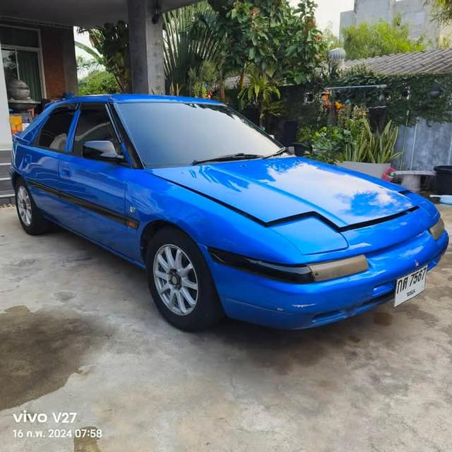 Mazda 323 สีน้ำเงิน 2