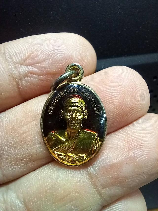 เหรียญเม็ดแตงลูกเคลือบ หลวงปู่ทวด วัดช้างให้ หลังพระอาจารย์ทิม วัดช้างให้ ปี 2555