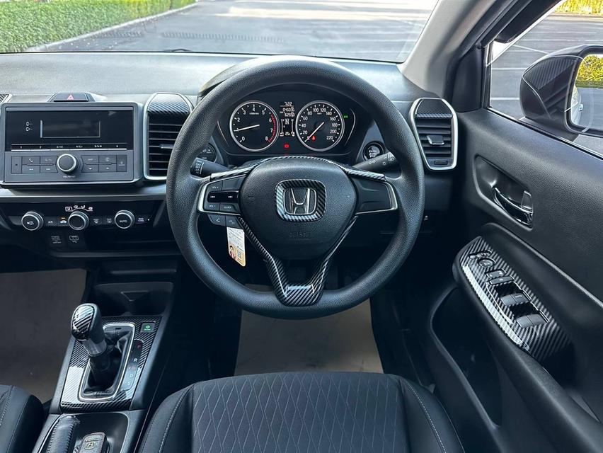 HONDA CITY 1.0 V Turbo โฉม ปัจจุบัน (4D) เกียร์ Auto สีขาว ปี 2021 12