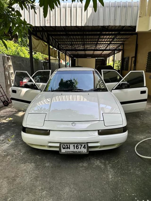 Mazda 323 สีขาว ปี 1992