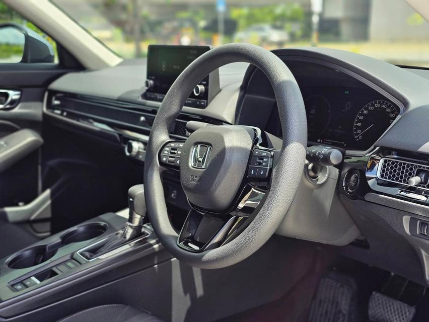 NEW HONDA CIVIC FE Sedan 4dr EL CVT FWD 1.5 Y22. สีเทา    เกียร์ออโต้  12