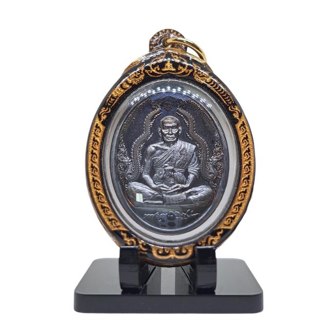 หลวงพ่อพัฒน์ รุ่นทรัพย์นาคิน เลี่ยมกันน้ำ
