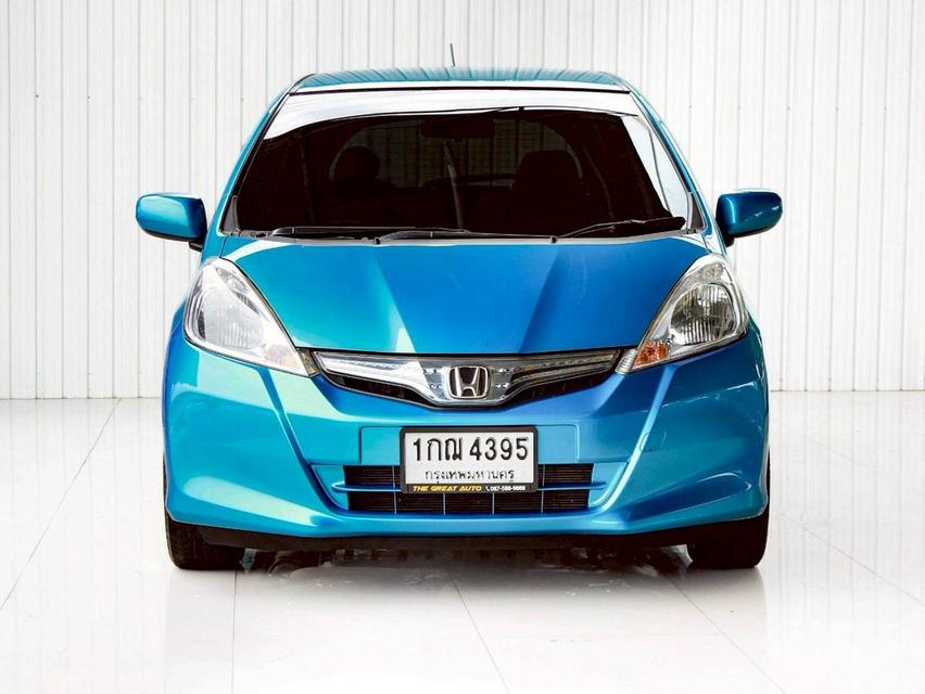 HONDA JAZZ 1.3 HYBRID ปี 2012 โฉม ปี08-14 เกียร์ AUTO สีฟ้า เครื่องยนต์ เบนซิน + ไฟฟ้า ไมล์น้อย 208,884 Km.