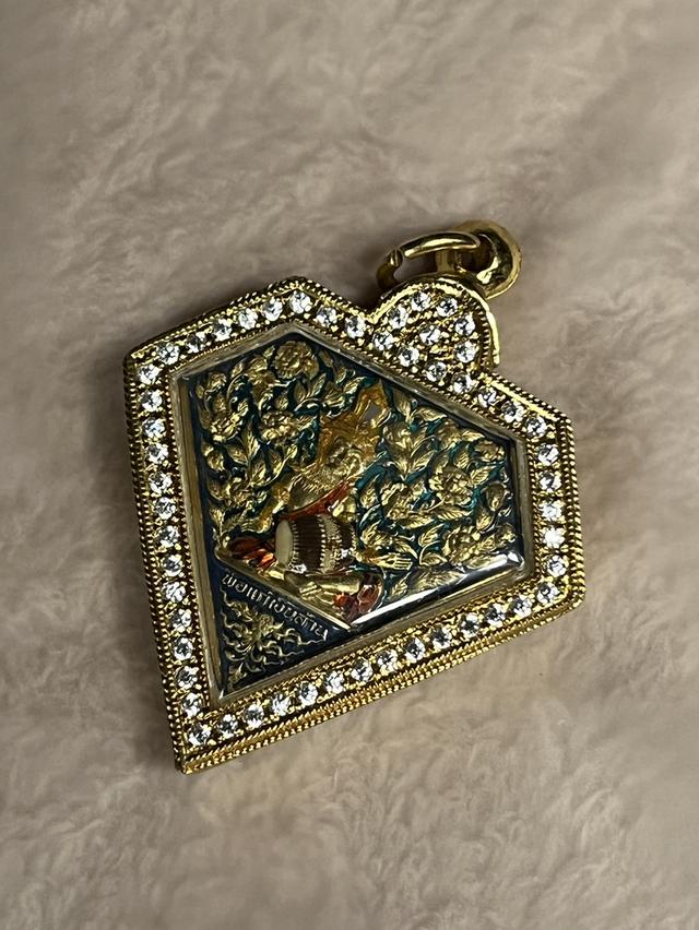 เหรียญพ่อแก่ตีตะโพนผ่านพิธีปลุกเสก 3