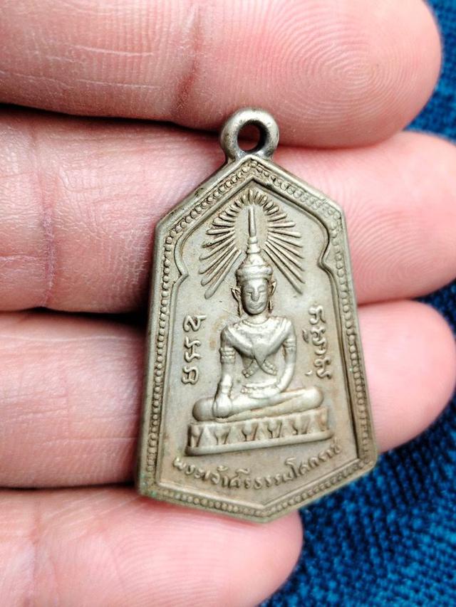 เหรียญพระเจ้าศรีธรรมาโศกราช รุ่นแรกปี 2506 ออกวัดหน้าพระธาตุ นครศรีธรรมราช วัสดุอาปาก้า