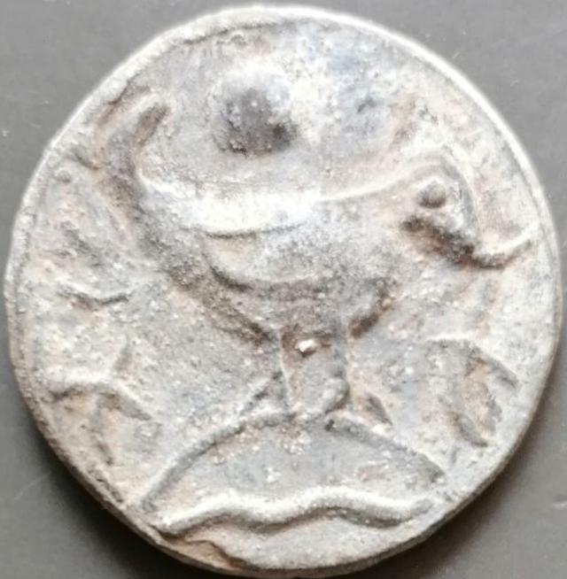 เหรียญโบราณ รูปนก ด้านหลังรูปควาย