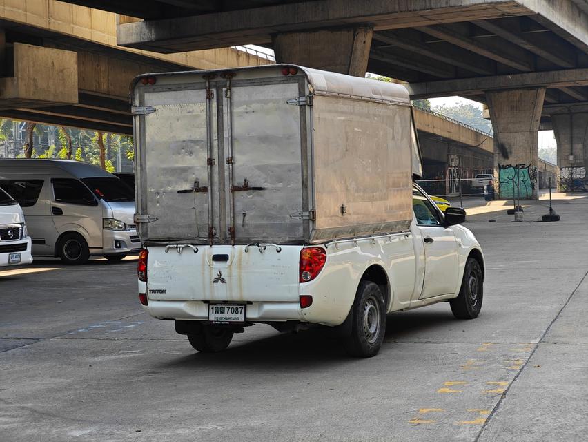 ขายรถ Mitsubishi Triton 2.4 หัวเดียว หลังคาสูง ปี 2015 สีขาว เกียร์ธรรมดา 4