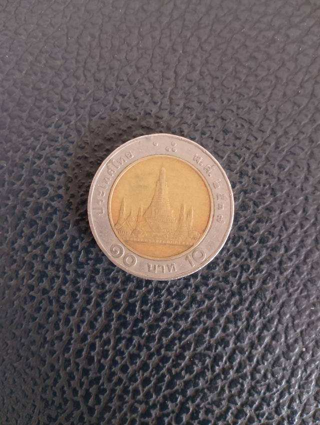 ปล่อยเหรียญสิบปี 2537 พระเศียรกลับค่ะ 1