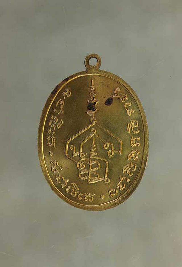 รูป เหรียญ อาจารย์นำ  รุ่นแรก  เนื้อทองฝาบาตร ค่ะ j447 1