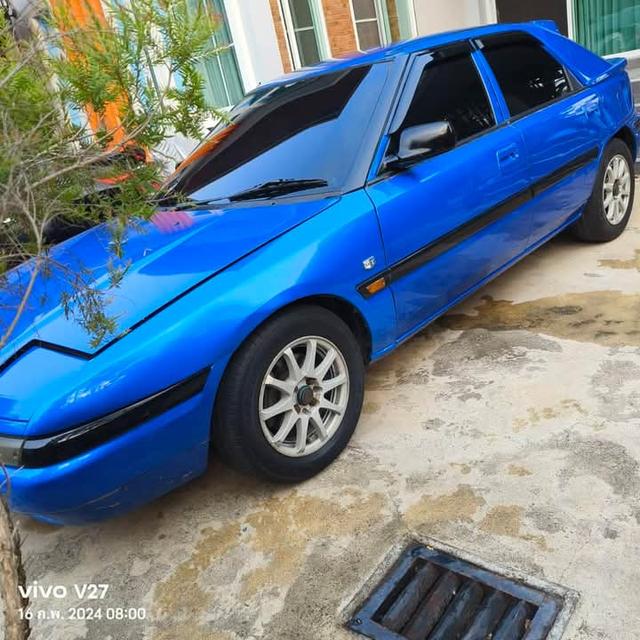 Mazda 323 สีน้ำเงิน 8