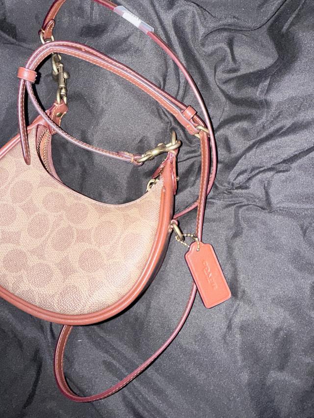 กระเป๋า coach jonie bag in signature canvas รูปที่ 9