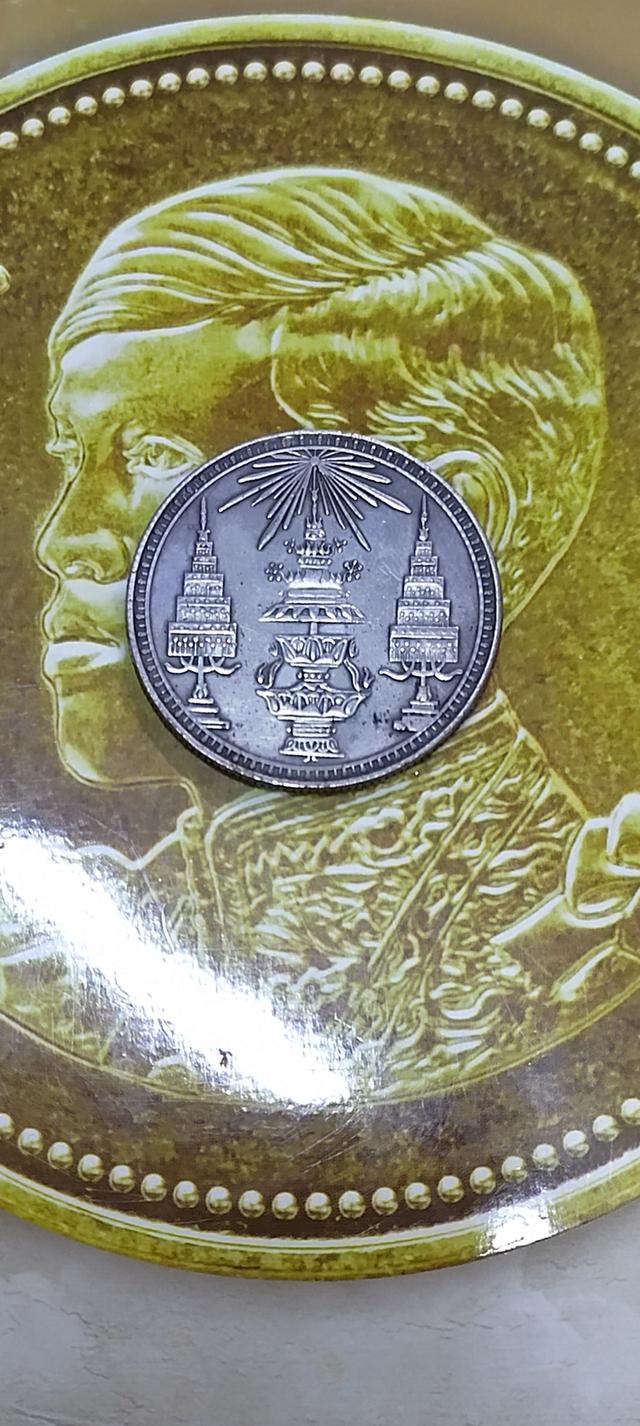 เหรียญกษาปณ์โลหะขาว ชนิดบาท พระจุลมงกฎ ข้างในพระแสงจักร พ.ศ. 2412