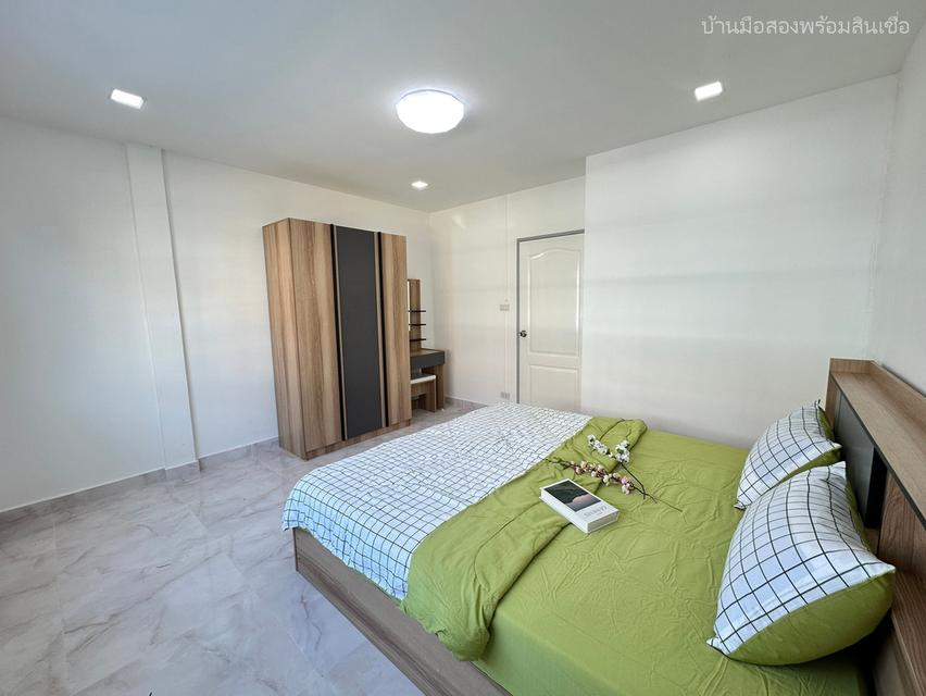 พูนสินธานี 1 เคหะร่มเกล้า 12