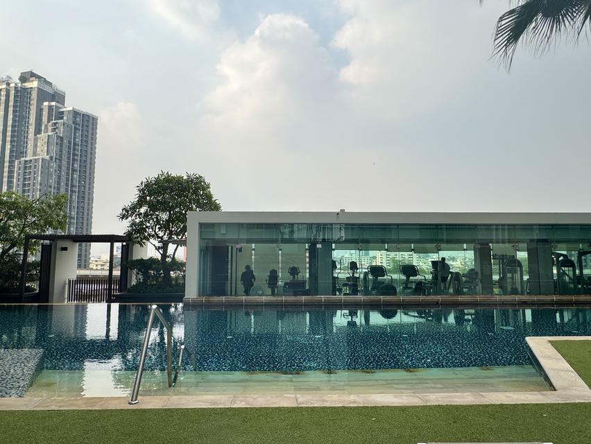 ขาย คอนโดใกล้ BTS ห้องมุม📍มีช่องจอดรถส่วนตัว🚗ไม่ต้องวนหาที่จอด 74.45 ตรม วิวดี 16