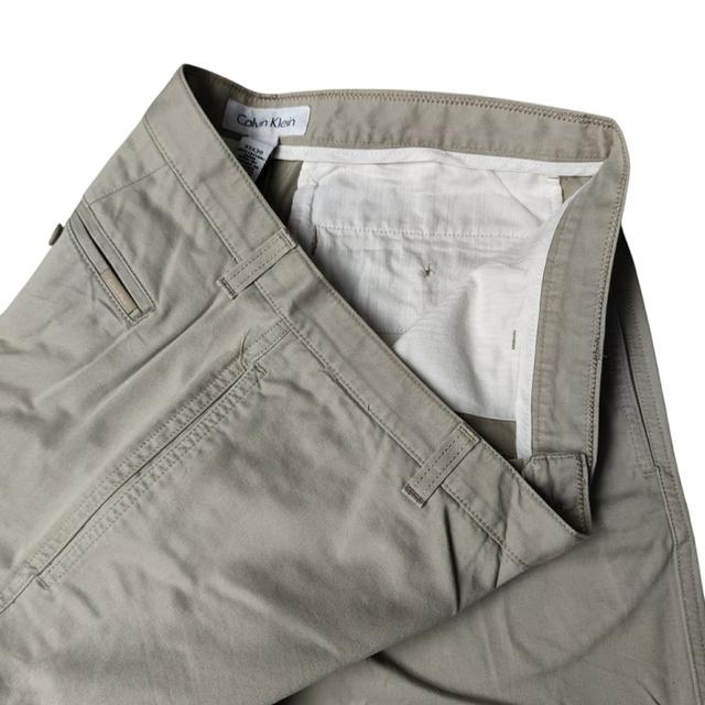 ♦️ Calvin Klein ผ้าไม่ยืดสภาพใหม่มือสองงานแบรนด์ใส่ทำงานใส่เที่ยวได้  Size วัดจริง34 ยาว40.5 ปลายขา8 6