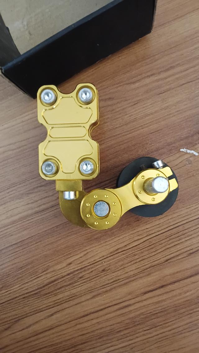 ตัวดันโซ่มอเตอร์ไซค์สีทอง