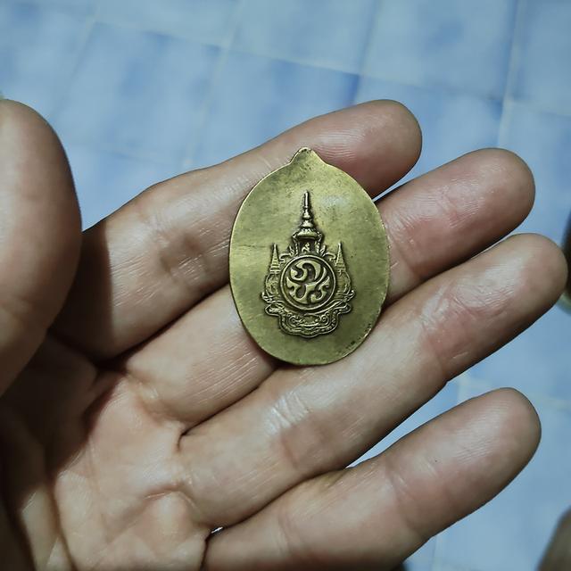 เหรียญในหลวงทรงกล้อง