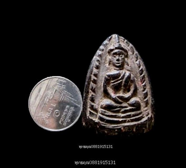 พระพุทธเนื้อกะลาแกะ หลังจารมือ