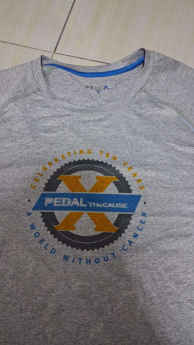 เสื้อยืดวินเทจมือสอง สีเทา PEDAL THE CAUSE A World Without Cancer PRIMAL Men's Performance Shirt XL มือสองสภาพดี ลายสกรีนสวยสไตล์Sport ทรงสวย รูปย่อยที่ 2