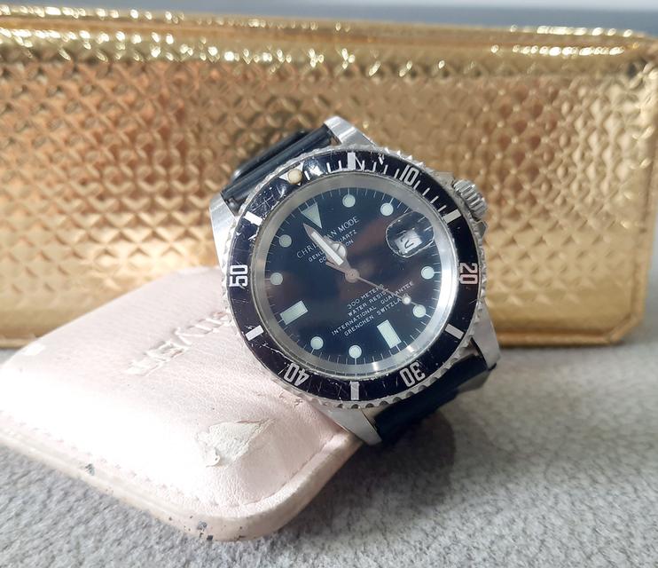 ขอขายนาฬิกาข้อมือของยี่ห้อ Christian mode ทรง Submariner แท้ Japan made มีการการันตีจาก Switzerland กันน้ำได้ 300 ม. กระจกซาฟีขนาดหน้าปัด 4ซม.