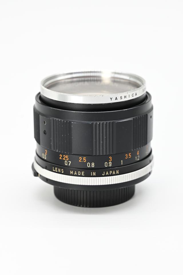 เลนส์มือหมุน Tomioka japan auto chinon 55mm f1.2.M42(rare)