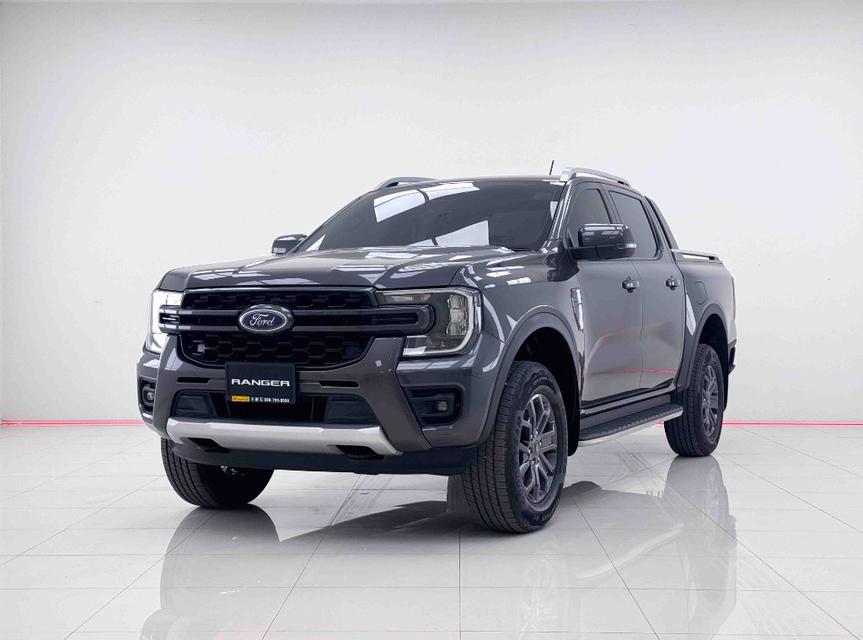 FORD RANGER 2.0 BI-TURBO WILDTRAK HI-RIDER DOUBLE CAB HI-RIDER เกียร์ AT ปี 2024 สีดำ เลข​ไม์  90,435 กมราคา 734,000 บาทโทร 0929699899 6B565