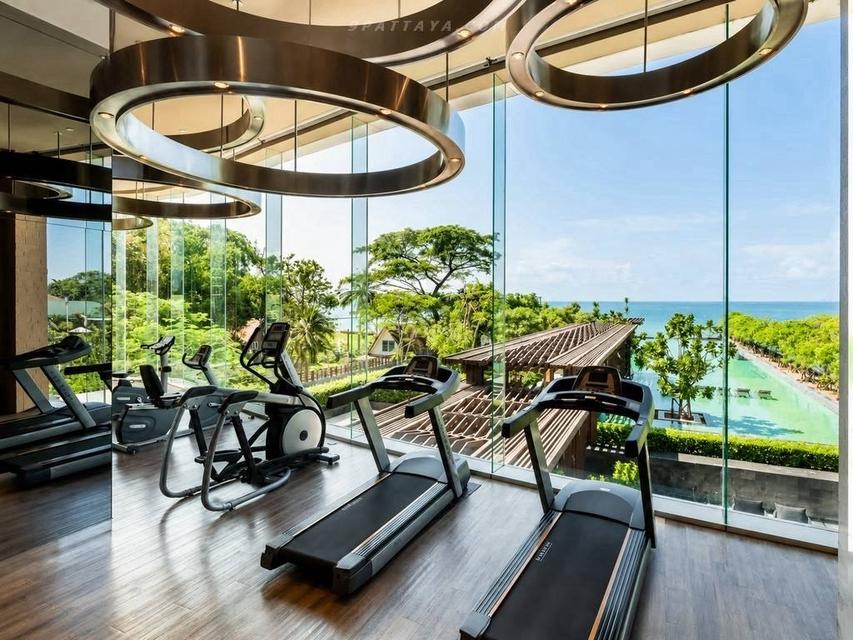 For Sale — 1-Bedroom Condo at Reflection Jomtien Beach Beachfront Condo Unit size: 61 sq.m Floor: 21• High-floor unit Beautiful view Fully furnished 11