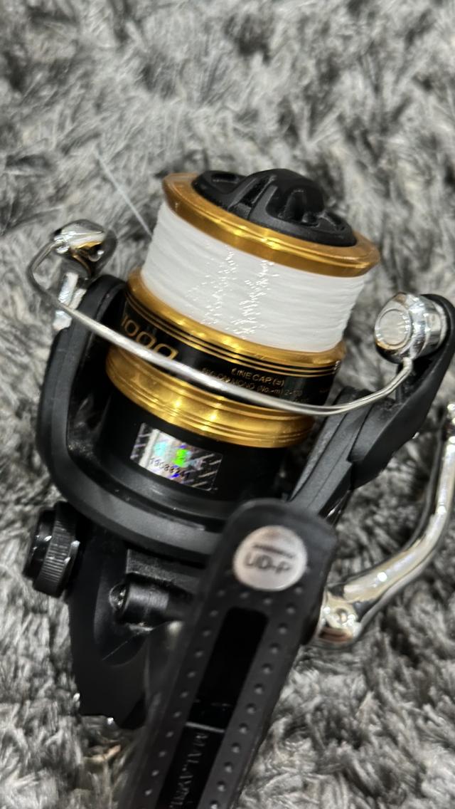 รอกตกปลา SHIMANO FX 1000