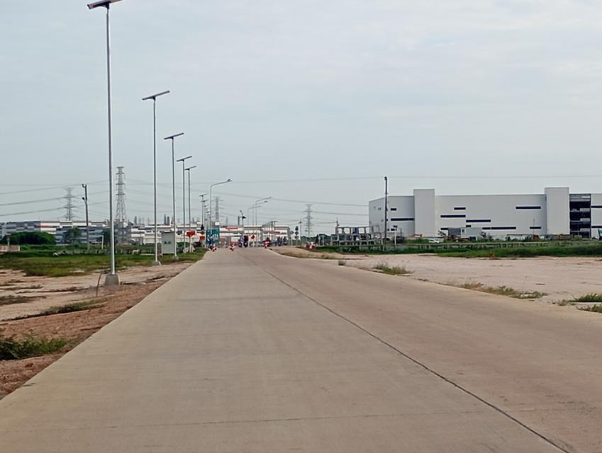 ที่ดิน ติดถนนคอนกรีต ห่างจากนิคมอมตะสมาร์ทซิตี้  1 กิโลเมตร 6