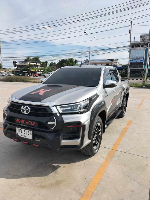 Toyota Hilux Revo ยกสูง 4 ประตูสีบรอนซ์ ดีเซล เกียร์ออโต้ 6