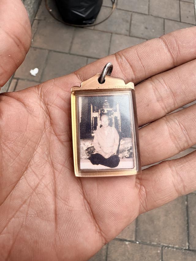 รูปถ่ายคุณย่าบุญเรือน โตงบุญเติม ข้างหลังเป็นตะกรุดยาคูล