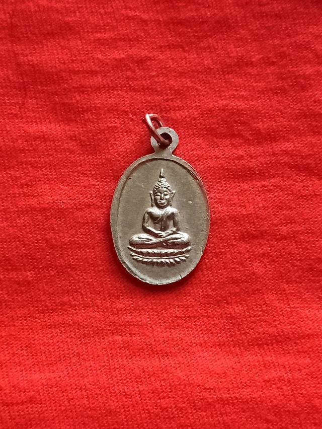 เหรียญกวักหลังพระพุทธ