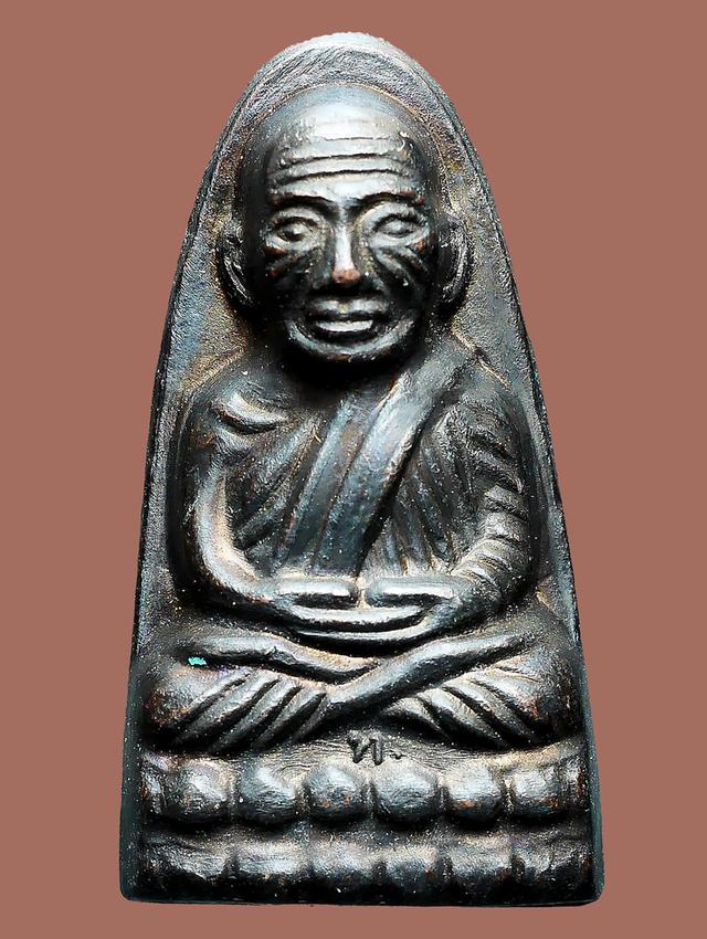 หลวงปู่ทวดเตารีด หลังหนังสือเล็ก.....เก่าๆ