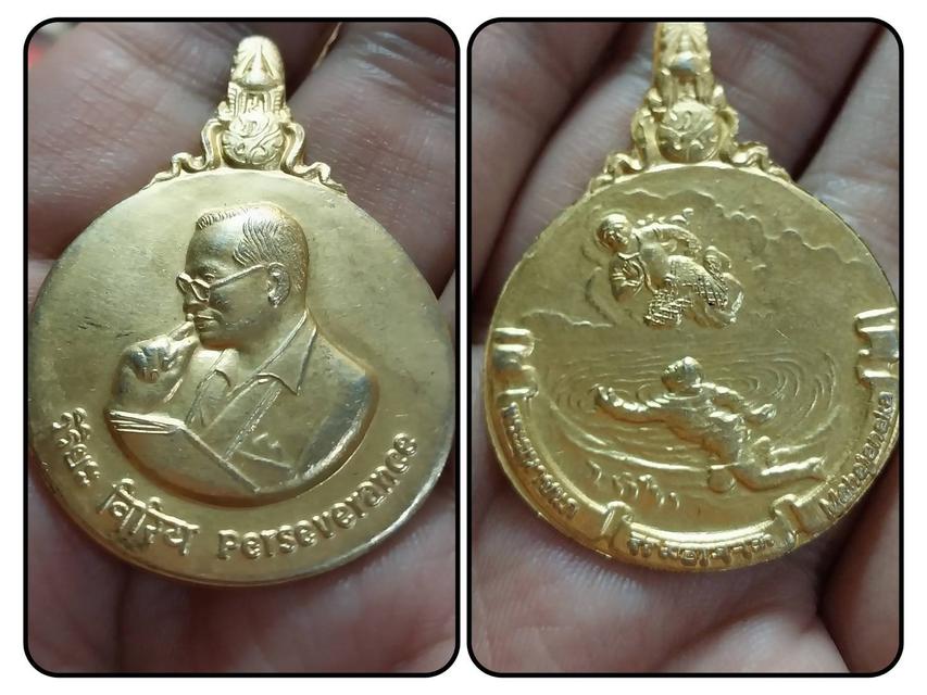 รูป เหรียญที่ระลึกพระมหาชนก เนื้อทองแดงชุบกะไหล่ทอง 1