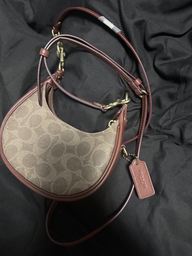 กระเป๋า coach jonie bag in signature canvas