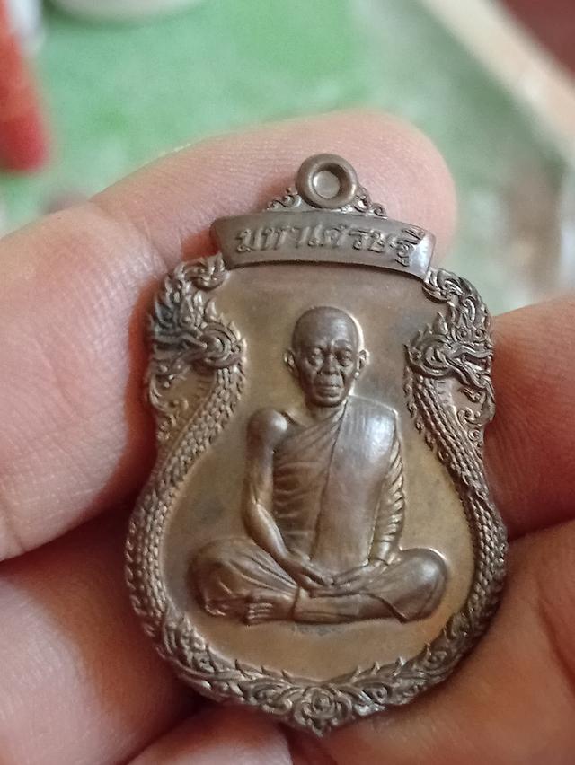 เหรียญพญานาครอบ หลวงพ่อคูณ รุ่นมหาเศรษฐีปี57วัดบ้านไร่หลังฝังกระตุด1ดอกทันหลวงพ่อ