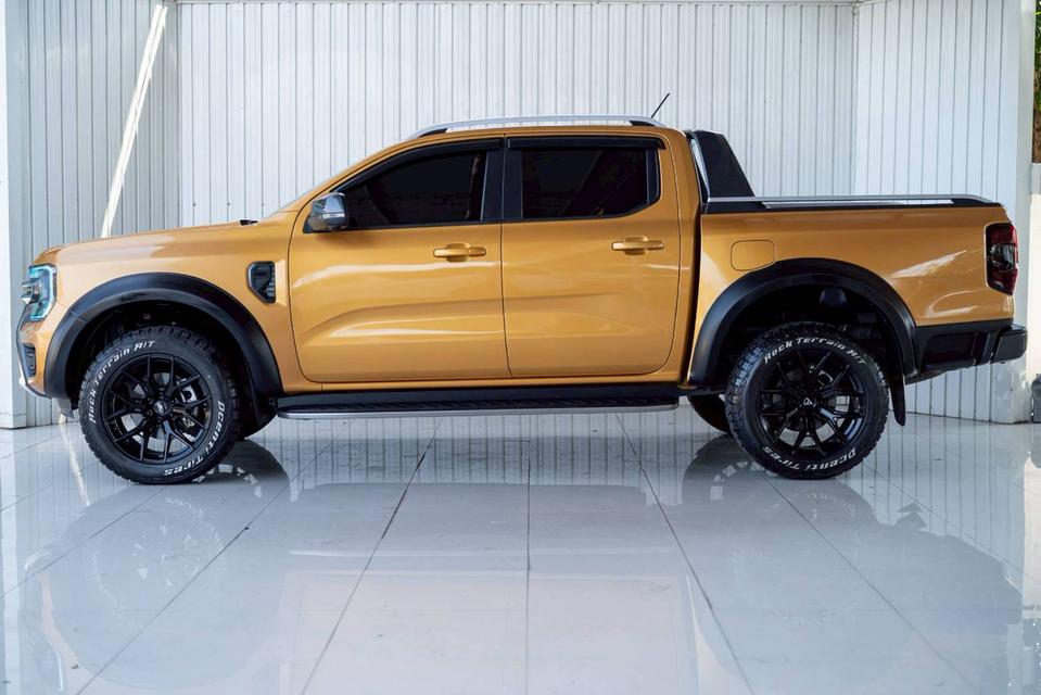 FORD RANGER 2.0 TURBO WILDTRAK ปี 2023 เกียร์A/T ขับ 2 สีเหลืองโฉม HI-RIDER DOUBLE CAB รูปที่ 5