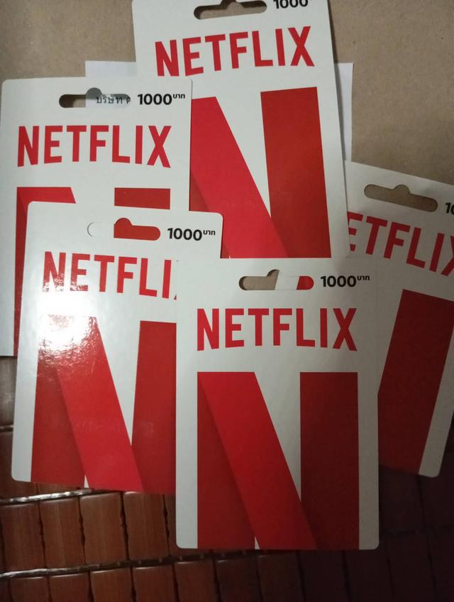 à¸£à¸¹à¸› Selling Net Flix prepaid cards for watching premium movies and games, 1,000 baht each, 5 cards in total