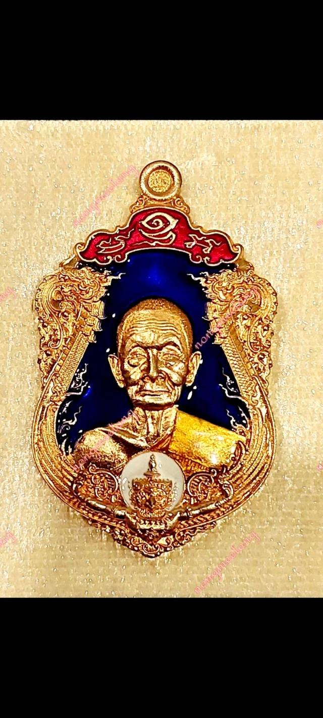 หลวงปู่บุญมา โชติธัมโม เหรียญเสมารวยรุ่งเรือง เนื้อทองแดง ผิวส้มลงยาพื้นน้ำ ง.ลงยาซุ้มแดง ลงยาจีวs เลข ๑๑๔สำนักสงฆ์เขาแก้วทอง 